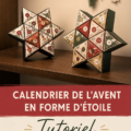 Calendrier de l'Avent en forme d'étoile réalisé en scrapbooking, décoré avec des couleurs festives.