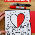 Carte d'amour DIY inspirée par Keith Haring avec des motifs colorés.